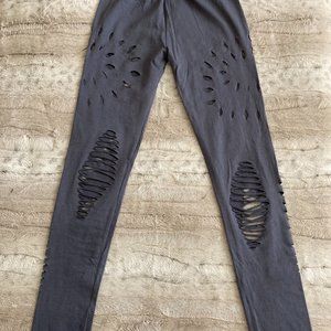 Small NWOT Grey Yoga Leggings with cut-out details.